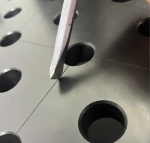 Chisels and other similar tools can be used to clean etched grooves